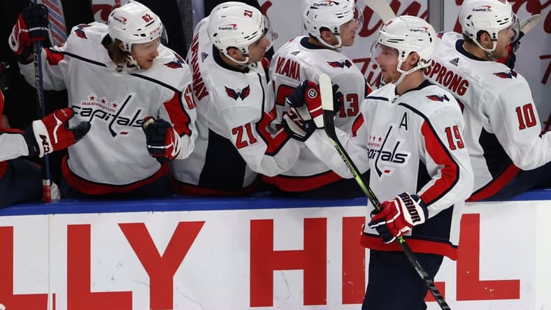 Mar 15, 2021; Buffalo, New York, USA;  Washington Capitals center Nicklas Backstrom (19) celebrates his goal during the second period against the Buffalo Sabres at KeyBank Center. Mandatory Credit: Timothy T. Ludwig-USA TODAY Sports