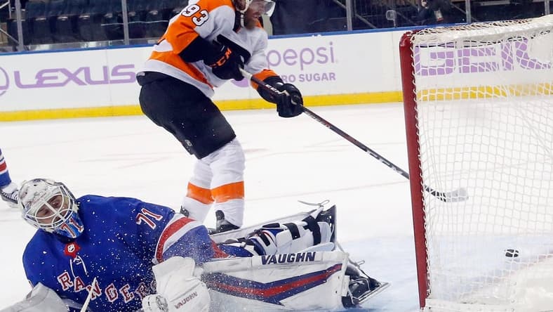 Mar 15, 2021; New York, New York, USA; Jakub Voracek #93 of the Philadelphia Flyers scores at 3:47 of overtime against Keith Kinkaid #71 of the New York Rangers at Madison Square Garden on March 15, 2021 in New York City. The Flyers defeated the Rangers 5-4 in overtime. Mandatory Credit: Bruce Bennett/POOL PHOTOS-USA TODAY Sports