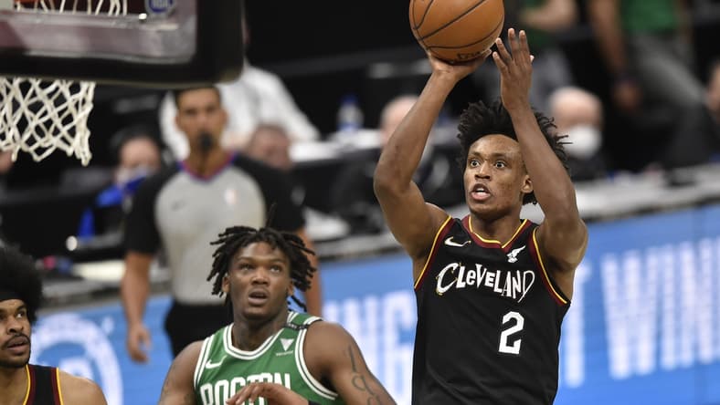 Mar 17, 2021; Cleveland, Ohio, USA; Cleveland Cavaliers guard Collin Sexton (2) shoots in the fourth quarter against the Boston Celtics at Rocket Mortgage FieldHouse. Mandatory Credit: David Richard-USA TODAY Sports