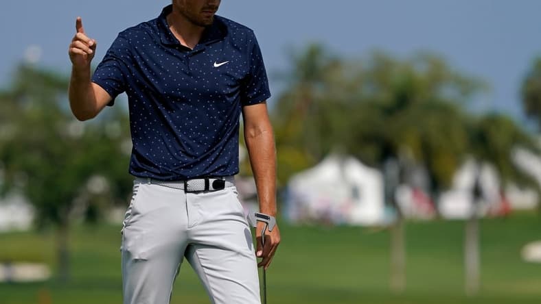 Mar 19, 2021; Palm Beach Gardens, Florida, USA; Aaron Wise reacts after making a putt for eagle on the 3rd green during the second round of The Honda Classic golf tournament at PGA National (Champion). Mandatory Credit: Jasen Vinlove-USA TODAY Sports