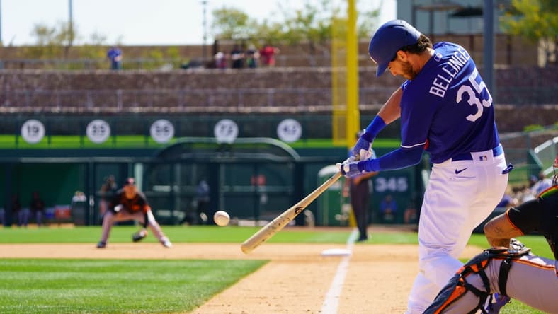 Mar 21, 2021; Phoenix, Arizona, USA; Los Angeles Dodgers outfielder Cody Bellinger (35) at bat against the San Francisco Giants during a Spring Training game at Camelback Ranch, Glendale. Mandatory Credit: Allan Henry-USA TODAY Sports