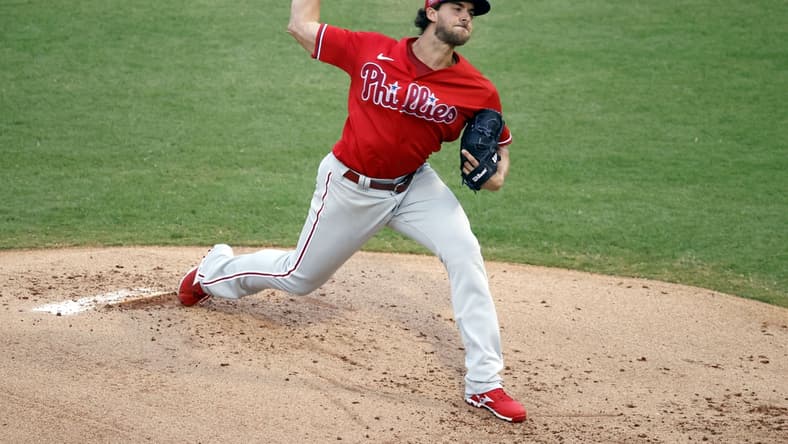 Mar 22, 2021; Tampa, Florida, USA;  Philadelphia Phillies starting pitcher Aaron Nola (27) throws a pitch against the New York Yankees during the first inning at George M. Steinbrenner Field. Mandatory Credit: Kim Klement-USA TODAY Sports