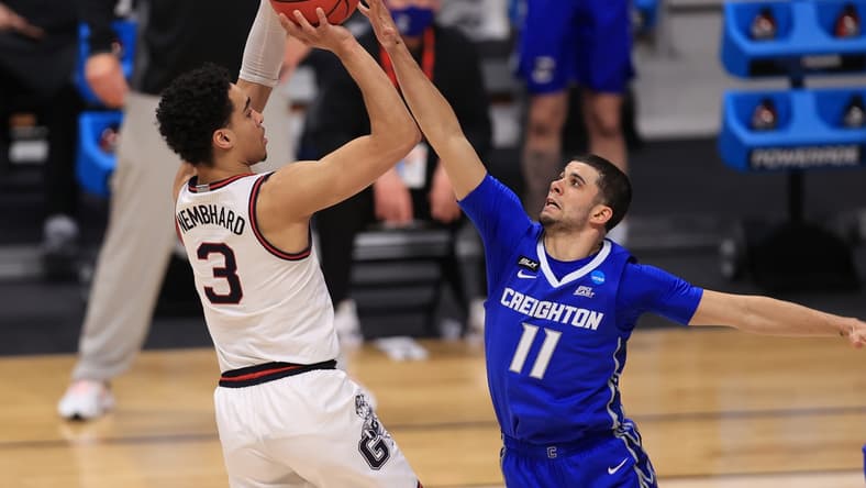 Mar 28, 2021; Indianapolis, IN, USA; Gonzaga Bulldogs guard Andrew Nembhard (3) shoots the ball against Creighton Bluejays guard Marcus Zegarowski (11) in the first half during the Sweet 16 of the 2021 NCAA Tournament at Hinkle Fieldhouse.  Mandatory Credit: Aaron Doster-USA TODAY Sports