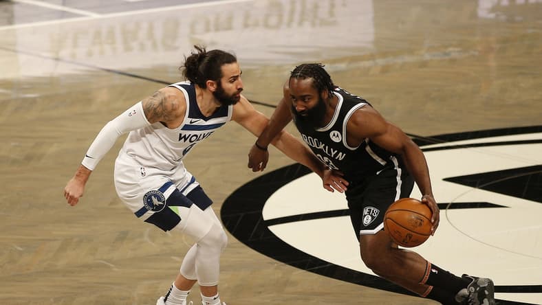 Mar 29, 2021; Brooklyn, New York, USA; Brooklyn Nets guard James Harden (13) dribbles the ball against Minnesota Timberwolves guard Ricky Rubio (9) during the first half at Barclays Center. Mandatory Credit: Andy Marlin-USA TODAY Sports