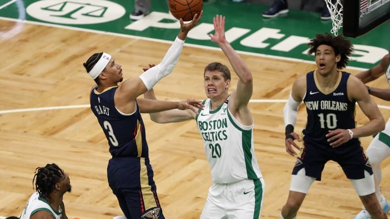 Mar 29, 2021; Boston, Massachusetts, USA; New Orleans Pelicans guard Josh Hart (3) goes to the basket past Boston Celtics forward Moritz Wagner (20) during the first quarter at TD Garden. Mandatory Credit: Winslow Townson-USA TODAY Sports