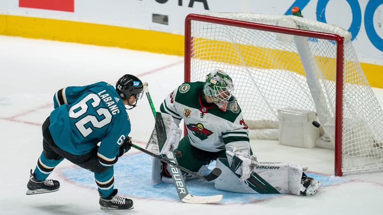 Mar 29, 2021; San Jose, California, USA; San Jose Sharks right wing Kevin Labanc (62) scores against Minnesota Wild goaltender Cam Talbot (33) during the shootout at SAP Center at San Jose. Mandatory Credit: Neville E. Guard-USA TODAY Sports