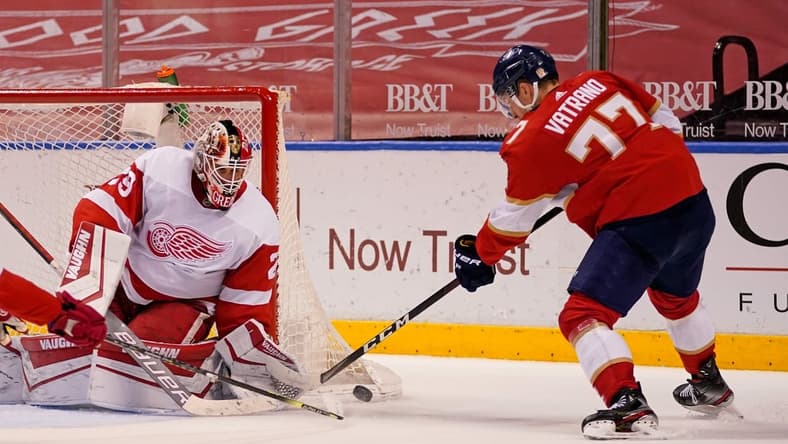 Mar 30, 2021; Sunrise, Florida, USA; Detroit Red Wings goaltender Thomas Greiss (29) blocks the shot of Florida Panthers center Frank Vatrano (77) during the second period at BB&T Center. Mandatory Credit: Jasen Vinlove-USA TODAY Sports