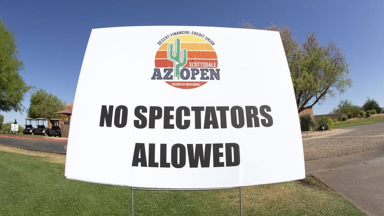 May 12, 2020; Scottsdale, Arizona, USA; No spectators allowed signs at the club house during round one at the Scottsdale AZ Open at Talking Stick Golf Club's O odham course. This is the first semi-significant sports event to take place in the Valley since the sports shutdown in March due to the coronavirus (COVID-19) pandemic. Mandatory Credit: Rob Schumacher-USA TODAY NETWORK