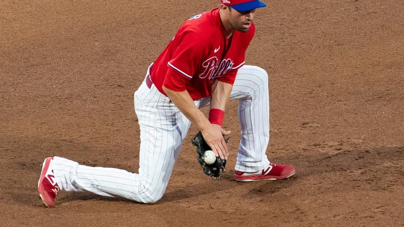 Jul 19, 2020; Philadelphia, Pennsylvania, USA; Philadelphia Phillies third baseman Neil Walker fields a ground ball against the Baltimore Orioles at Citizens Bank Park. Mandatory Credit: Bill Streicher-USA TODAY Sports