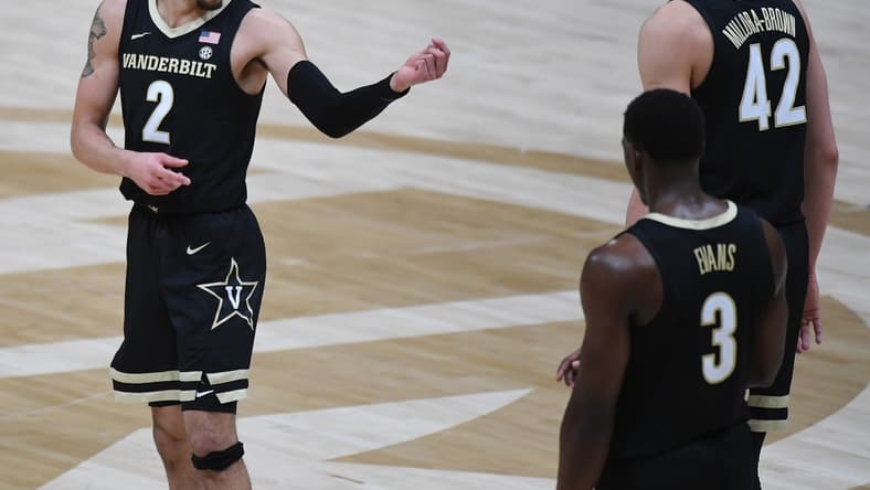 Mar 11, 2021; Nashville, TN, USA; Vanderbilt Commodores guard Scotty Pippen Jr. (2) talks with Vanderbilt Commodores forward Quentin Millora-Brown (42) coming out of a timeout during the second half against the Florida Gators at Bridgestone Arena. Mandatory Credit: Christopher Hanewinckel-USA TODAY Sports