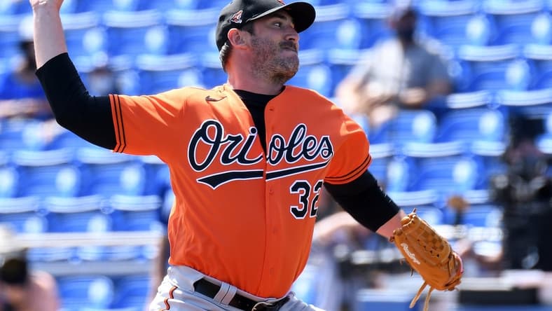 Mar 5, 2021; Dunedin, Florida, USA; Baltimore Orioles pitcher Matt Harvey (32) throws a pitch in the first inning against the Toronto Blue Jays during spring training at TD Ballpark. Mandatory Credit: Jonathan Dyer-USA TODAY Sports