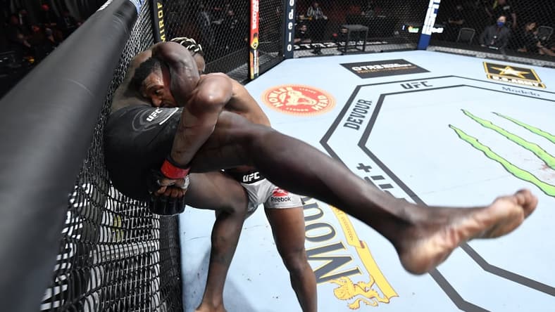 Mar 27, 2021; Las Vegas, NV, USA;   Alonzo Menifield takes down Fabio Cherant in their light heavyweight fight during the UFC 260 event at UFC APEX on March 27, 2021 in Las Vegas, Nevada.   Mandatory Credit: Jeff Bottari/Handout Photo via USA TODAY Sports