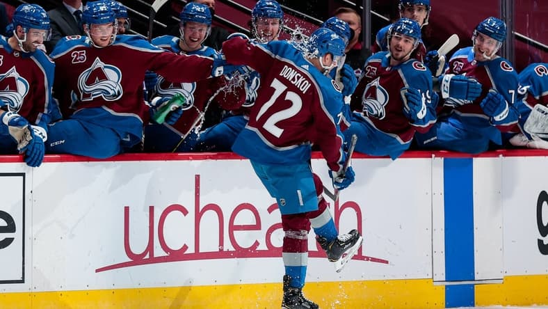 Mar 31, 2021; Denver, Colorado, USA; Colorado Avalanche right wing Joonas Donskoi (72) is doused with water after scoring a hat trick in the first period against the Arizona Coyotes at Ball Arena. Mandatory Credit: Isaiah J. Downing-USA TODAY Sports