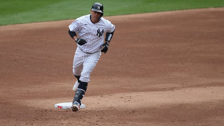 Apr 1, 2021; Bronx, New York, USA; New York Yankees catcher Gary Sanchez (24) rounds the bases after hitting a two run home run against the Toronto Blue Jays during the second inning of an opening day game at Yankee Stadium. Mandatory Credit: Brad Penner-USA TODAY Sports