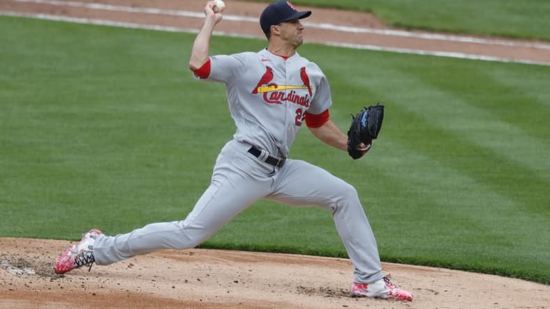 Apr 1, 2021; Cincinnati, Ohio, USA; St. Louis Cardinals starting pitcher Jack Flaherty (22) throws against the Cincinnati Reds during the first inning at Great American Ball Park. Mandatory Credit: David Kohl-USA TODAY Sports