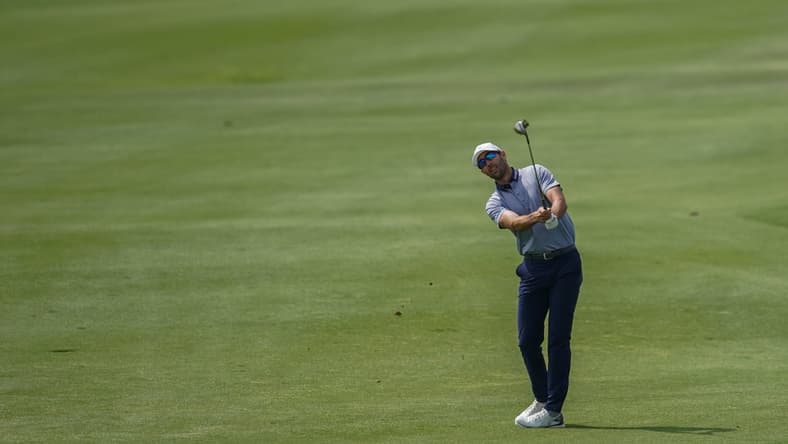Apr 2, 2021; San Antonio, Texas, USA; Cameron Tringale hits his third shot on hole 18 during the second round of the Valero Texas Open golf tournament. Mandatory Credit: Daniel Dunn-USA TODAY Sports