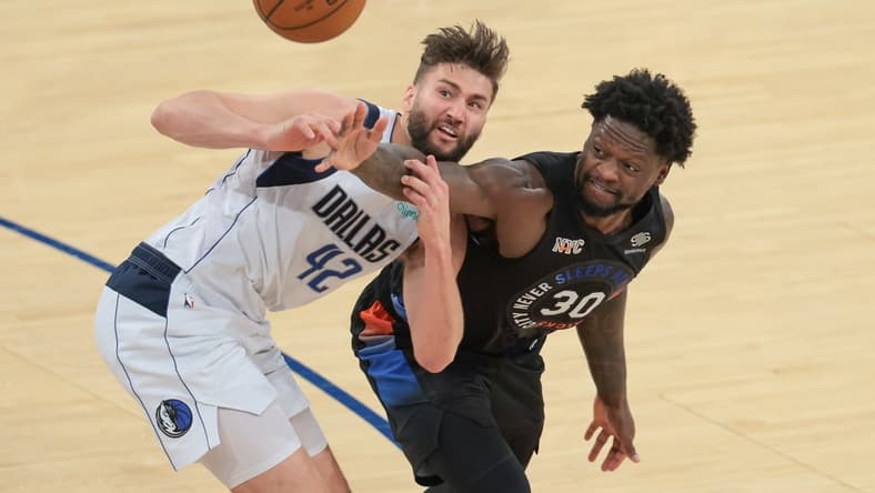 Apr 2, 2021; New York, New York, USA; New York Knicks forward Julius Randle (30) battles for a loose ball against Dallas Mavericks forward Maxi Kleber (42) during the first half at Madison Square Garden. Mandatory Credit: Vincent Carchietta-USA TODAY Sports