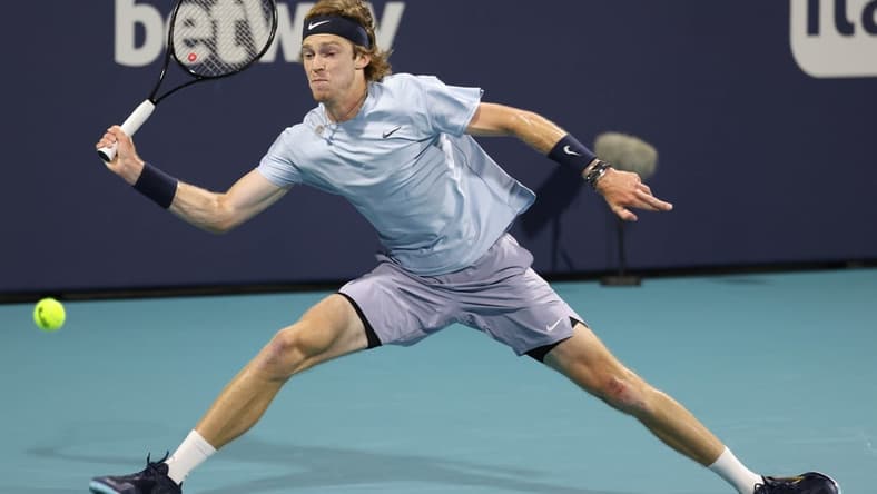 Apr 2, 2021; Miami, Florida, USA; Andrey Rublev of Russia reaches for a forehand against Hubert Hurkacz of Poland (not pictured) in a men's singles semifinal in the Miami Open at Hard Rock Stadium. Mandatory Credit: Geoff Burke-USA TODAY Sports