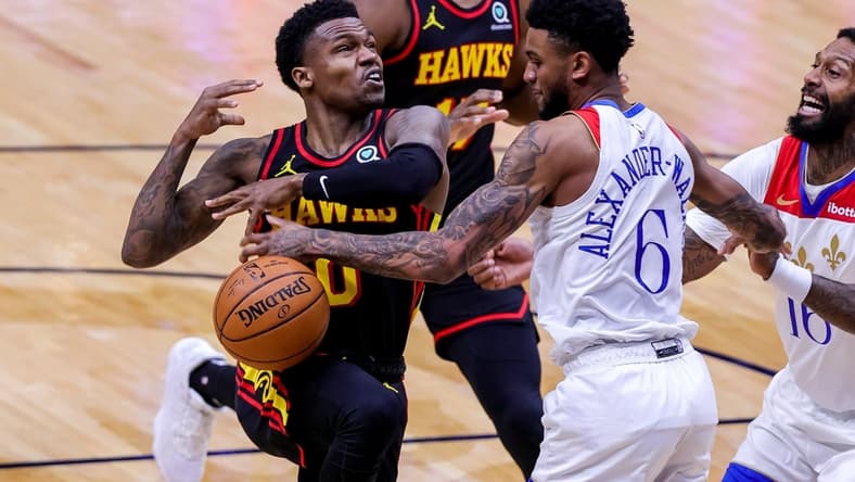 Apr 2, 2021; New Orleans, Louisiana, USA;  New Orleans Pelicans guard Nickeil Alexander-Walker (6) blocks the shot of Atlanta Hawks guard Brandon Goodwin (0) during the first half at the Smoothie King Center. Mandatory Credit: Stephen Lew-USA TODAY Sports