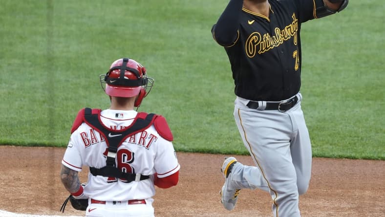 Apr 5, 2021; Cincinnati, Ohio, USA; Pittsburgh Pirates third baseman Phillip Evans (24) reacts after hitting a solo home run against the Cincinnati Reds during the first inning at Great American Ball Park. Mandatory Credit: David Kohl-USA TODAY Sports