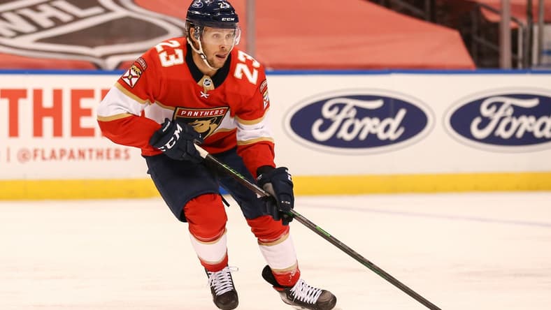 Apr 1, 2021; Sunrise, Florida, USA; Florida Panthers center Carter Verhaeghe (23) skates with the puck against the Detroit Red Wings during the first period at BB&T Center. Mandatory Credit: Sam Navarro-USA TODAY Sports