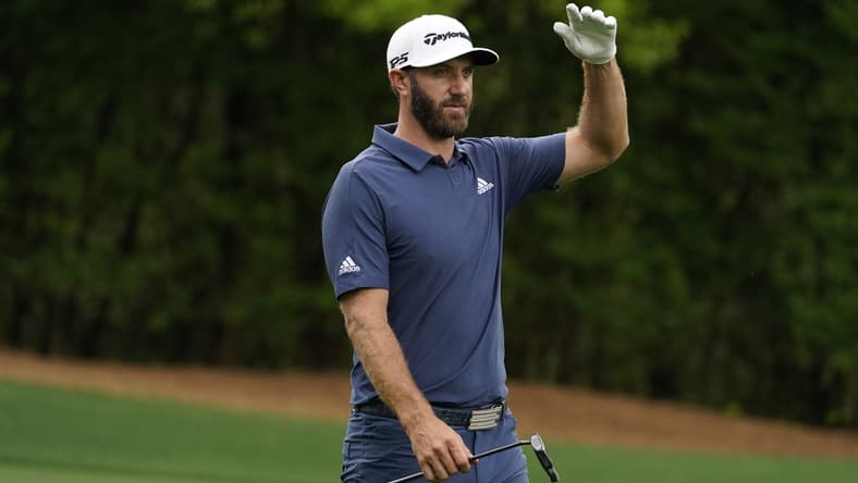Apr 9, 2021; Augusta, Georgia, USA; Dustin Johnson walks on the 11th hole during the second round of The Masters golf tournament. Mandatory Credit: Rob Schumacher-USA TODAY Sports