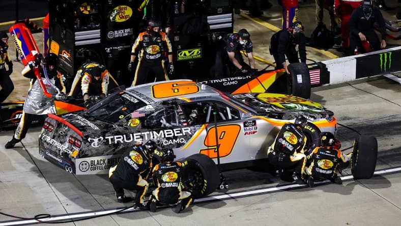 Apr 9, 2021; Martinsville, VA, USA; NASCAR Xfinity Series driver Noah Gragson (9) makes a pit stop at Martinsville Speedway. Mandatory Credit: Ryan Hunt-USA TODAY Sports