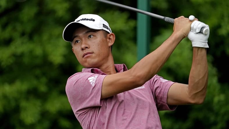 Apr 10, 2021; Augusta, Georgia, USA; Collin Morikawa plays his shot from the 14th tee during the third round of The Masters golf tournament. Mandatory Credit: Rob Schumacher-USA TODAY Sports