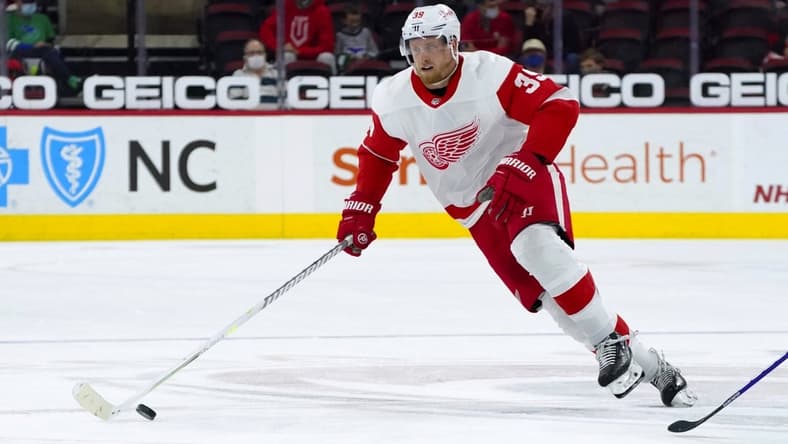 Apr 10, 2021; Raleigh, North Carolina, USA;  Detroit Red Wings right wing Anthony Mantha (39) skates with the puck against the Carolina Hurricanes at PNC Arena. Mandatory Credit: James Guillory-USA TODAY Sports