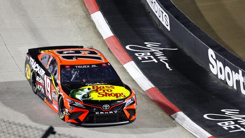 Apr 10, 2021; Martinsville, Virginia, USA; NASCAR Cup Series driver Martin Truex Jr. (19) races at the Blue-Emu Maximum Pain Relief 500 at Martinsville Speedway. Mandatory Credit: Ryan Hunt-USA TODAY Sports