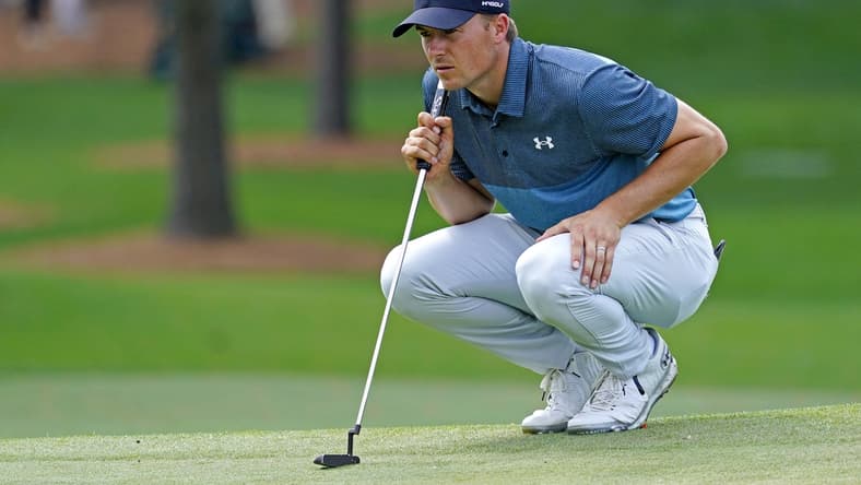 Apr 11, 2021; Augusta, Georgia, USA; Jordan Spieth lines up his putt on the seventh green during the final round of The Masters golf tournament. Mandatory Credit: Michael Madrid-USA TODAY Sports