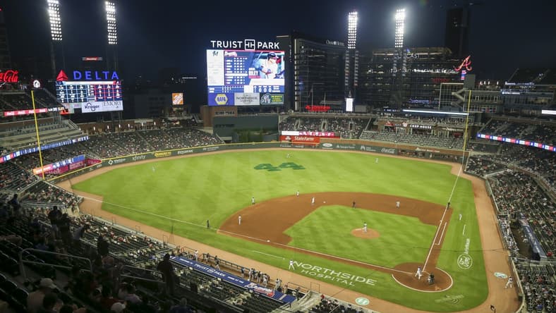 Apr 12, 2021; Atlanta, Georgia, USA; A general view of the number 44 on the outfield grass honoring the legacy of Atlanta Braves outfielder Hank Aaron (44) during a game against the Miami Marlins in the fourth inning at Truist Park. Mandatory Credit: Brett Davis-USA TODAY Sports