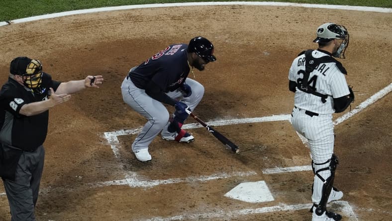 Apr 13, 2021; Chicago, Illinois, USA; Cleveland Indians designated hitter Franmil Reyes (32) reacts after striking out against the Chicago White Sox during the fourth inning at Guaranteed Rate Field. Mandatory Credit: David Banks-USA TODAY Sports