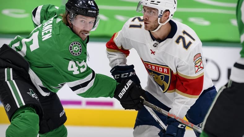 Apr 13, 2021; Dallas, Texas, USA; Dallas Stars defenseman Sami Vatanen (45) defends against Florida Panthers center Alex Wennberg (21) during the first period at the American Airlines Center. Mandatory Credit: Jerome Miron-USA TODAY Sports