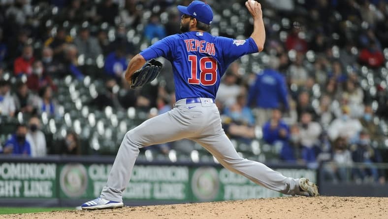 Apr 13, 2021; Milwaukee, Wisconsin, USA; Chicago Cubs relief pitcher Ryan Tepera (18) pitches during the fifth inning against the Milwaukee Brewers at American Family Field. Mandatory Credit: Michael McLoone-USA TODAY Sports