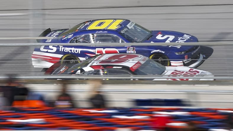 Apr 24, 2021; Talladega, AL, USA; NASCAR Xfinity Series driver Jeb Burton (10) and NASCAR Xfinity Series driver Josh Berry (8) at Talladega Superspeedway. Mandatory Credit: Marvin Gentry-USA TODAY Sports