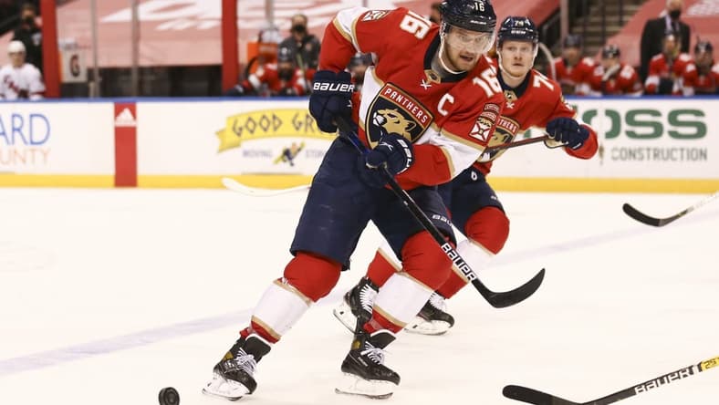 Apr 24, 2021; Sunrise, Florida, USA; Florida Panthers center Aleksander Barkov (16) skates with the puck against the Carolina Hurricanes during the second period at BB&T Center. Mandatory Credit: Sam Navarro-USA TODAY Sports