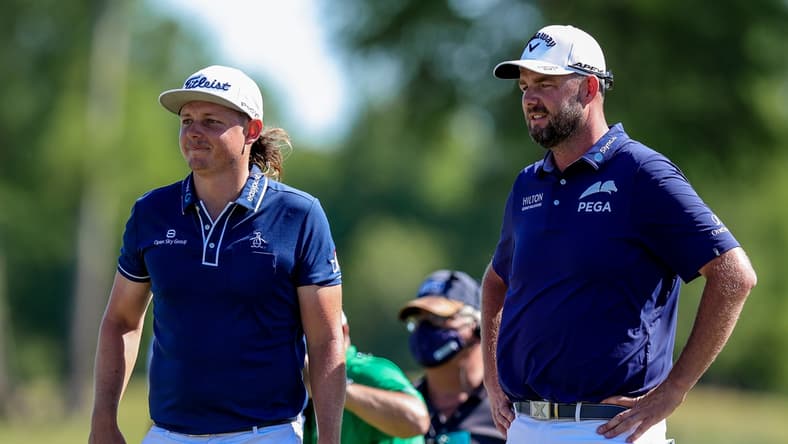 Apr 25, 2021; Avondale, Louisiana, USA;  Cameron Smith and Marc Leishman look on from the 13th green during the final round round of the Zurich Classic of New Orleans golf tournament. Mandatory Credit: Stephen Lew-USA TODAY Sports