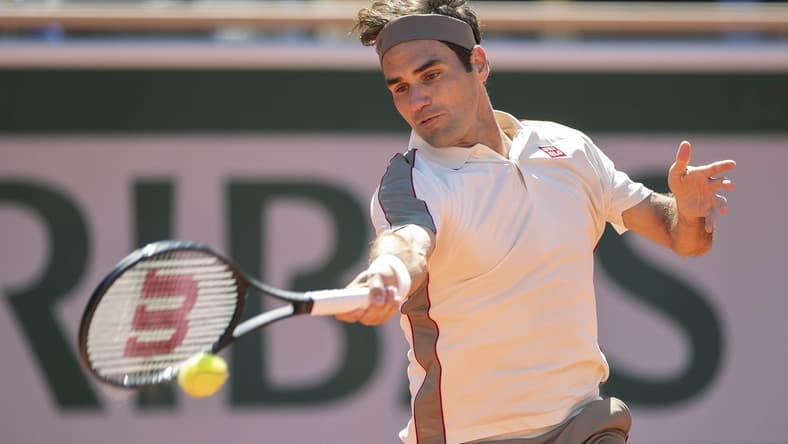 Jun 7, 2019; Paris, France: Roger Federer (SUI) in action during his match against Rafael Nadal (ESP) on day 13 of the 2019 French Open at Stade Roland Garros. Mandatory Credit: Susan Mullane-USA TODAY Sports