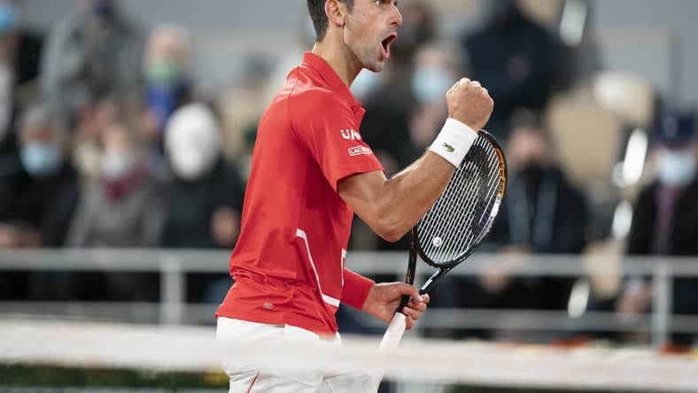 Oct 11, 2020;  Paris, France; Novak Djokovic (SRB) reacts during his match against Rafael Nadal (ESP) on day 15 at Stade Roland Garros. Mandatory Credit: Susan Mullane-USA TODAY Sports