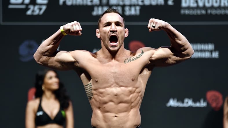 Jan 22, 2021; Abu Dhabi, UNITED ARAB EMIRATES;  Michael Chandler poses on the scale during the UFC 257 weigh-in at Etihad Arena on UFC Fight Island on January 22, 2021 in Abu Dhabi, United Arab Emirates.   Mandatory Credit: Jeff Bottari/Handout Photo via USA TODAY Sports