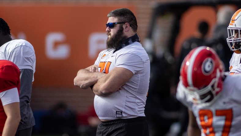 Jan 27, 2021; American offensive lineman Ben Cleveland of Georgia (74) watches drills during American practice at Hancock Whitney Stadium in Mobile, Alabama, USA; Mandatory Credit: Vasha Hunt-USA TODAY Sports