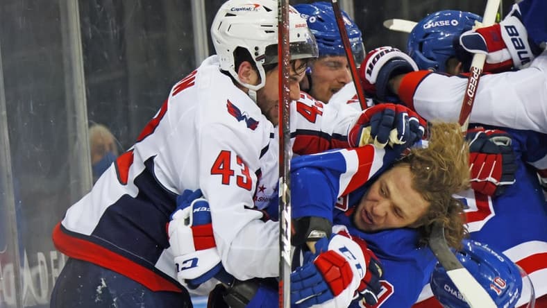 May 3, 2021; New York, New York, USA; Tom Wilson #43 of the Washington Capitals takes a roughing penalty during the second period against Artemi Panarin #10 of the New York Rangers at Madison Square Garden. Mandatory Credit: Bruce Bennett/POOL PHOTOS-USA TODAY Sports