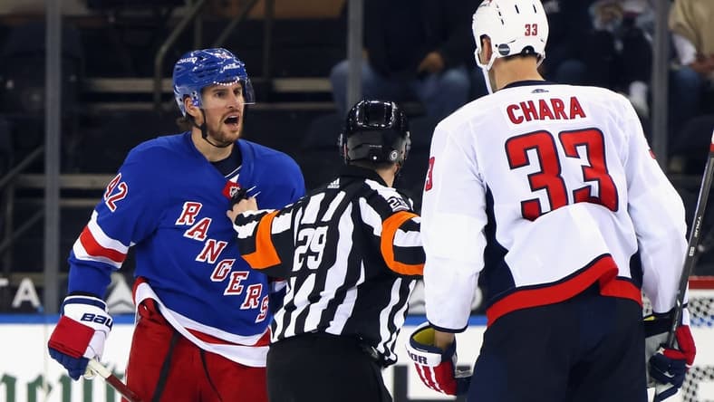 May 5, 2021; New York, New York, USA; Brendan Smith #42 of the New York Rangers chats with Zdeno Chara #33 of the Washington Capitals during the second period at Madison Square Garden. Mandatory Credit: Bruce Bennett/POOL PHOTOS-USA TODAY Sports