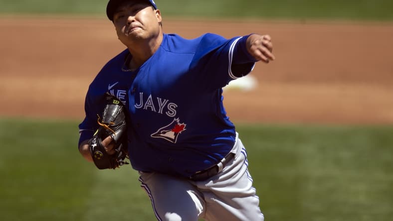 May 6, 2021; Oakland, California, USA; Toronto Blue Jays starting pitcher Hyun Jin Ryu (99) delivers a pitch against the Oakland Athletics during the second inning at RingCentral Coliseum. Mandatory Credit: D. Ross Cameron-USA TODAY Sports
