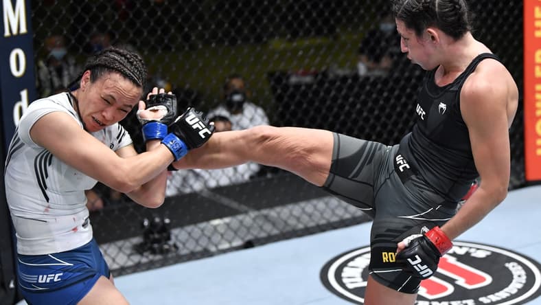 May 8, 2021; Las Vegas, NV, USA; Marina Rodriguez of Brazil kicks Michelle Waterson in a flyweight fight during the UFC Fight Night event at UFC APEX on May 08, 2021 in Las Vegas, Nevada.    Mandatory Credit: Chris Unger/Handout Photo via USA TODAY Sports