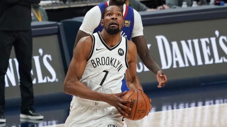 May 8, 2021; Denver, Colorado, USA; Brooklyn Nets forward Kevin Durant (7) drives to the basket against the Denver Nuggets during the fourth quarter at Ball Arena. Mandatory Credit: Troy Babbitt-USA TODAY Sports