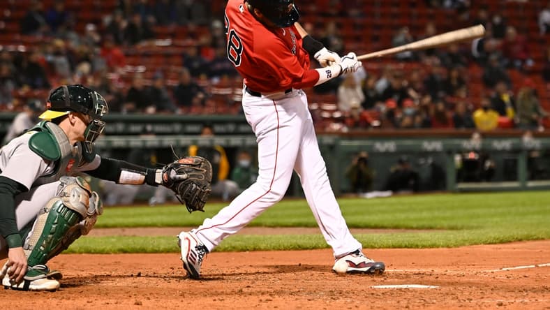May 11, 2021; Boston, Massachusetts, USA; Boston Red Sox left fielder J.D. Martinez (28) fouls the ball off of his foot during the fourth inning of a game against the Oakland Athletics at Fenway Park. Mandatory Credit: Brian Fluharty-USA TODAY Sports