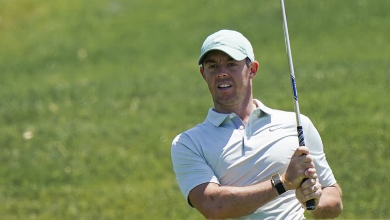 May 17, 2021; Kiawah Island, South Carolina, USA; Rory Mcilroy watches a chip shot during a practice round for the PGA Championship golf tournament at Ocean Course at Kiawah Island Resort. Mandatory Credit: David Yeazell-USA TODAY Sports
