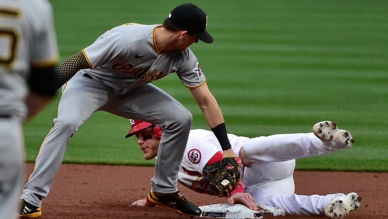 May 19, 2021; St. Louis, Missouri, USA;  St. Louis Cardinals center fielder Harrison Bader (48) steals second base as he slides safely past Pittsburgh Pirates shortstop Kevin Newman (27) during the second inning at Busch Stadium. Mandatory Credit: Jeff Curry-USA TODAY Sports